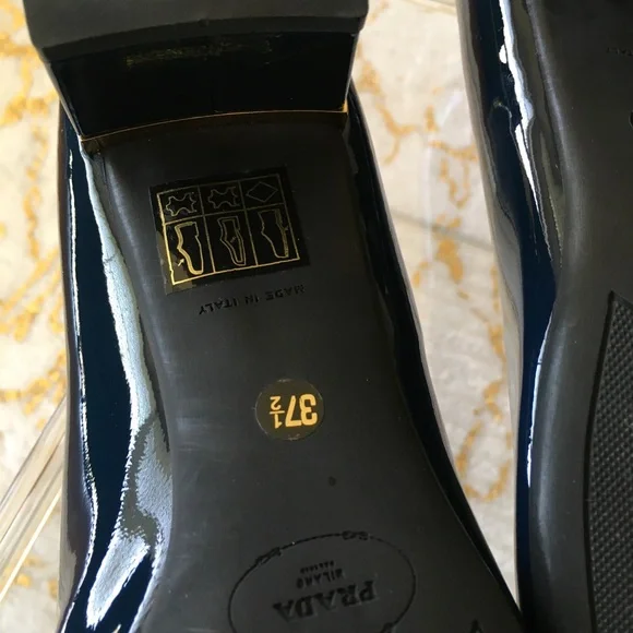 Prada Black and Gold Heels with Elegant Design